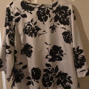 White blouse with roses